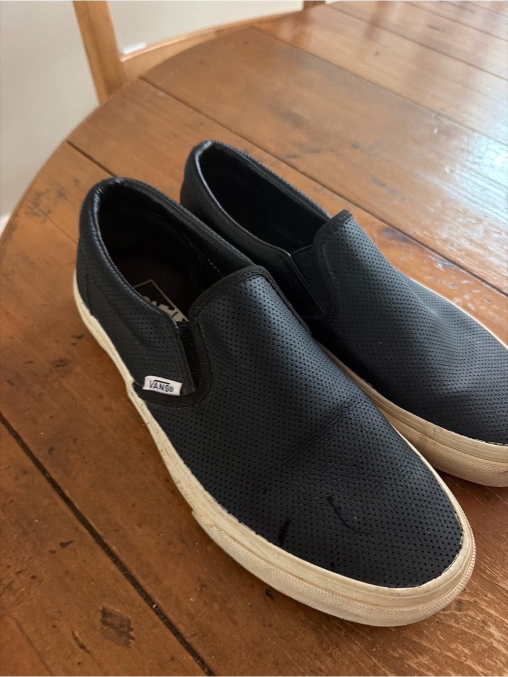 Vans Black Perforated Slip-On Sneakers with White Soles